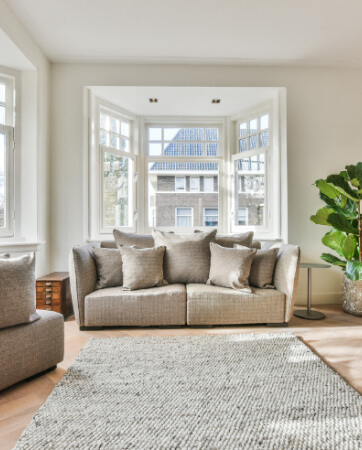 Spacious living room with grey sofas | An Post Insurance