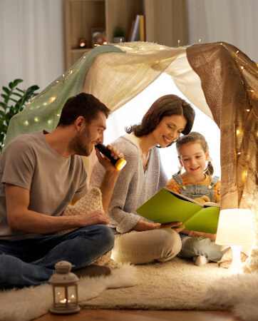 Family spending time together reading - An Post Insurance