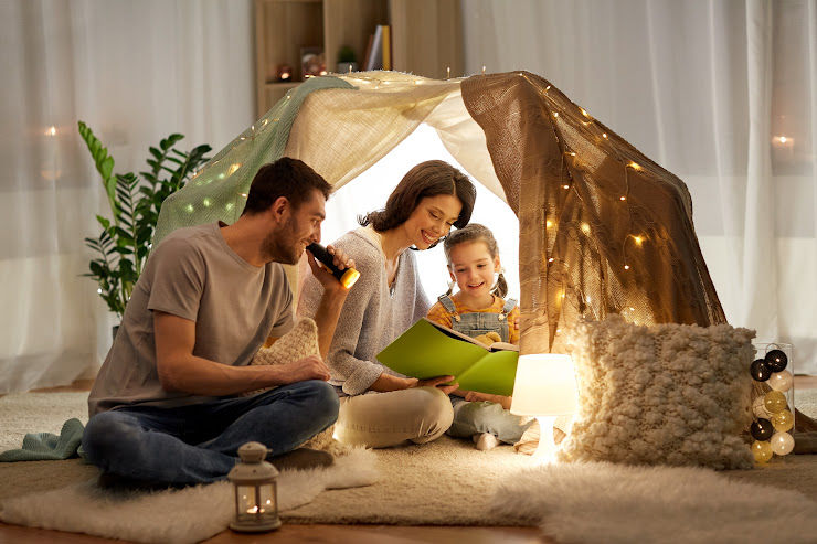 Family spending time together reading - An Post Insurance