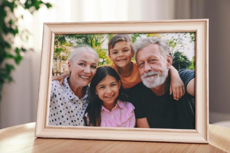 Picture frame with image of a family within