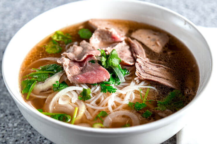 Pho soup dish | Travel Like a Local | An Post Insurance