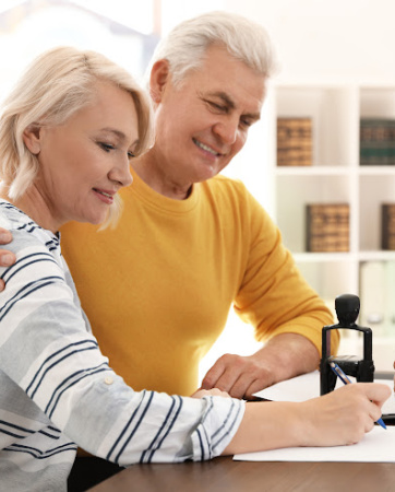 Couple working  working on a will and funeral plans