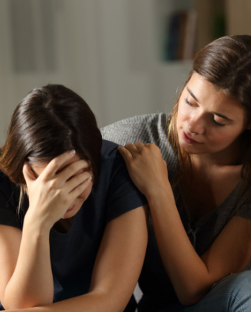 Young woman supporting a friend | Funeral Insurance | An Post Insurance