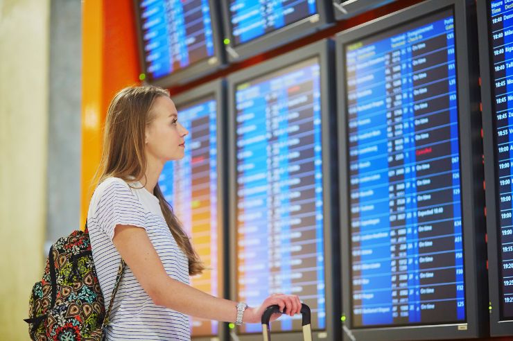 Woman in airport | Travel Insurance | An Post Insurance