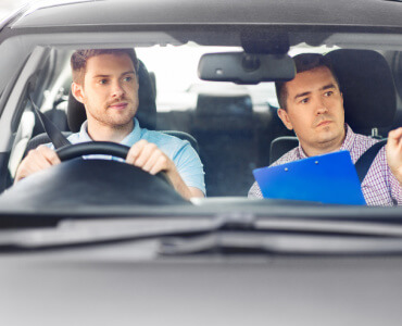 Young adult having driving lesson | Young drivers in Ireland | An Post Insurance
