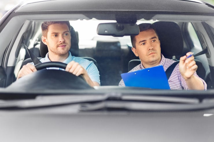 Young adult having driving lesson | Young drivers in Ireland | An Post Insurance