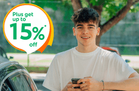 Young male driver smiling beside a car outdoors, with text “get 15% off” promoting affordable car insurance for younger drivers in Ireland
